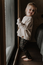 Legging évolutif junior noir à petites fleurs, grandeurs 6 à 12 ans - MomMe et Cie Inc.